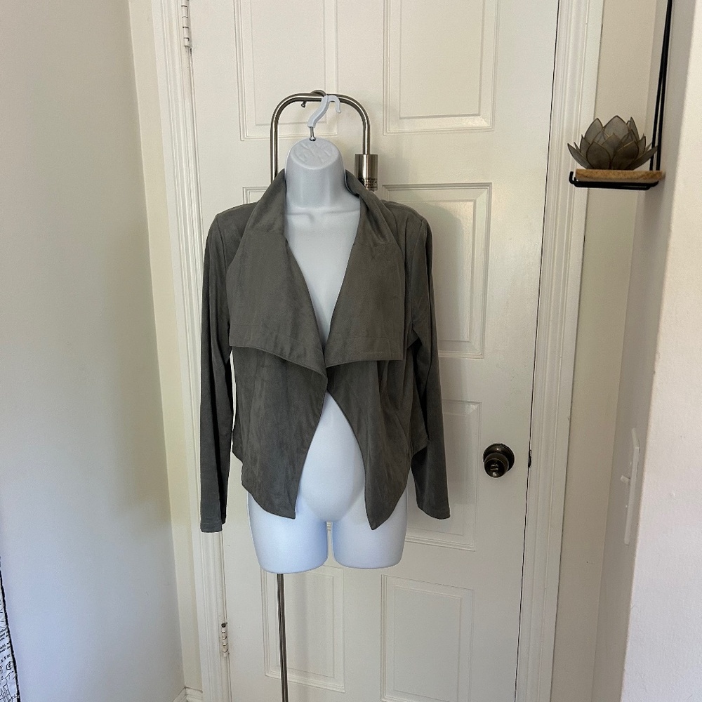 Soft lightweight jacket, suede like feel and in excellent condition!